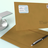 Custom printed return address labels on a roll available from CdesignsPrint.